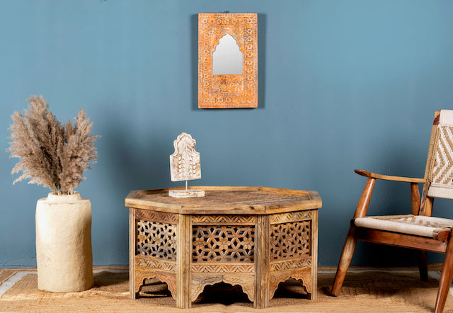 Octagonal mango wood coffee table with intricate floral and geometric carvings; durable hand-carved coffee table, 90 × 90 × 46 cm.