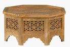 White background image of a octagonal mango wood coffee table with intricate floral and geometric carvings; durable hand-carved coffee table, 90 × 90 × 46 cm.