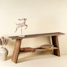 Front view image of a driftwood console table made from reclaimed wood, with lower shelf and weathered finish; sustainable furniture for entryways, 200 × 32 × 80 cm.
