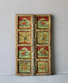 Hand-painted Indian antique teak door with elephant and floral motifs, distressed green finish, vintage wall panels for unique home decor.