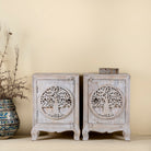 Pair of mango wood bedside tables with hand-carved tree motifs and antique finish; perfect bedroom furniture and mango wood furniture, 50 × 70 × 40 cm.