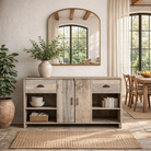 Lifestyle image of a wooden console table  with 2 drawers, 2 doors, and 4 open shelves; reclaimed wood storage console in rustic design, 150 × 50 × 80 cm.