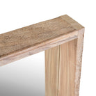 Close up image of a rectangular reclaimed wooden mirror with sandblasted finish and integrated shelf; rustic bathroom mirror with storage, 90 × 15 × 60 cm.