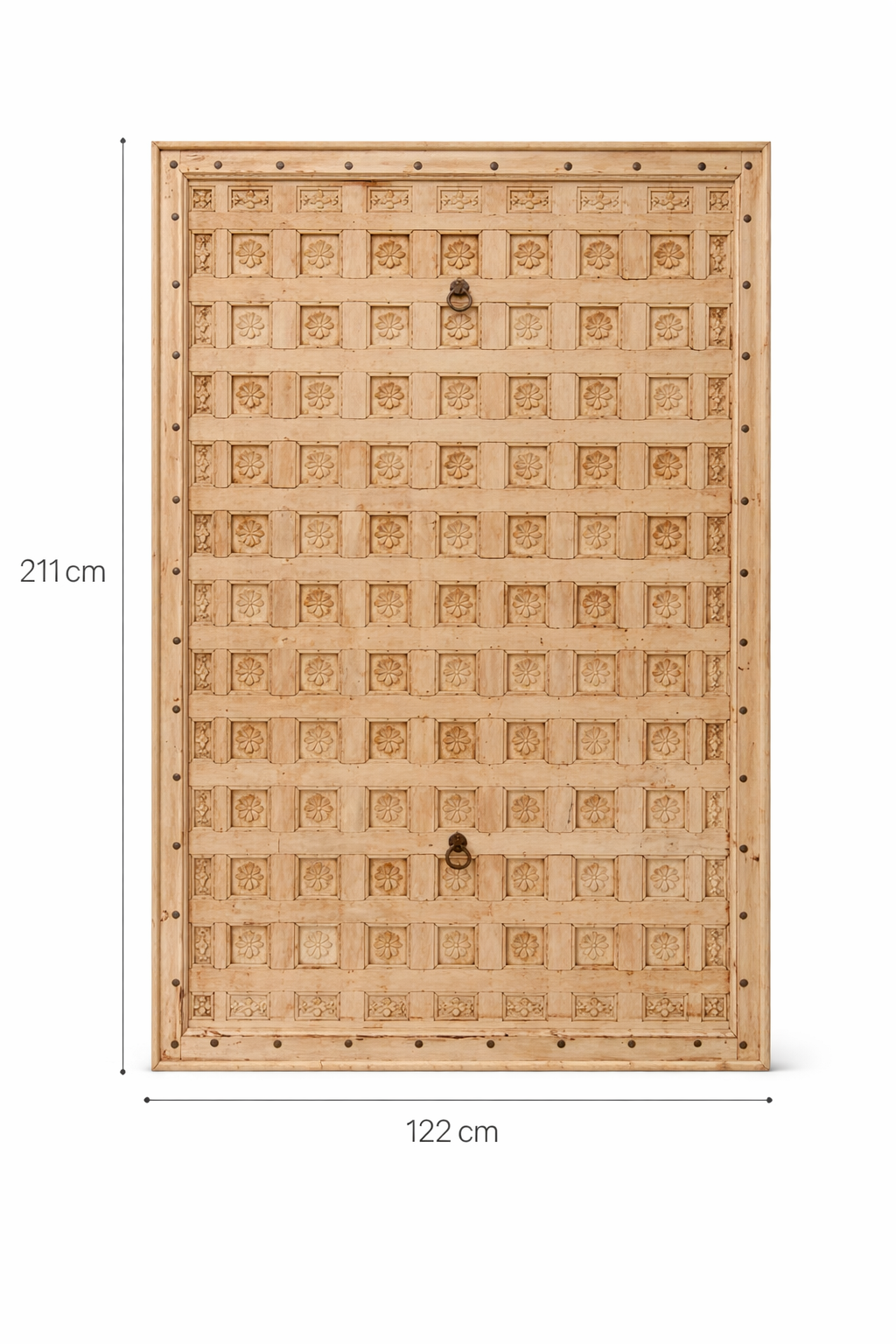 White background image of a Bheem hand-carved teak headboard made from an old Indian ceiling door, featuring floral panel carvings and a whitewashed finish—an authentic piece of old door headboards and old Indian door furniture.