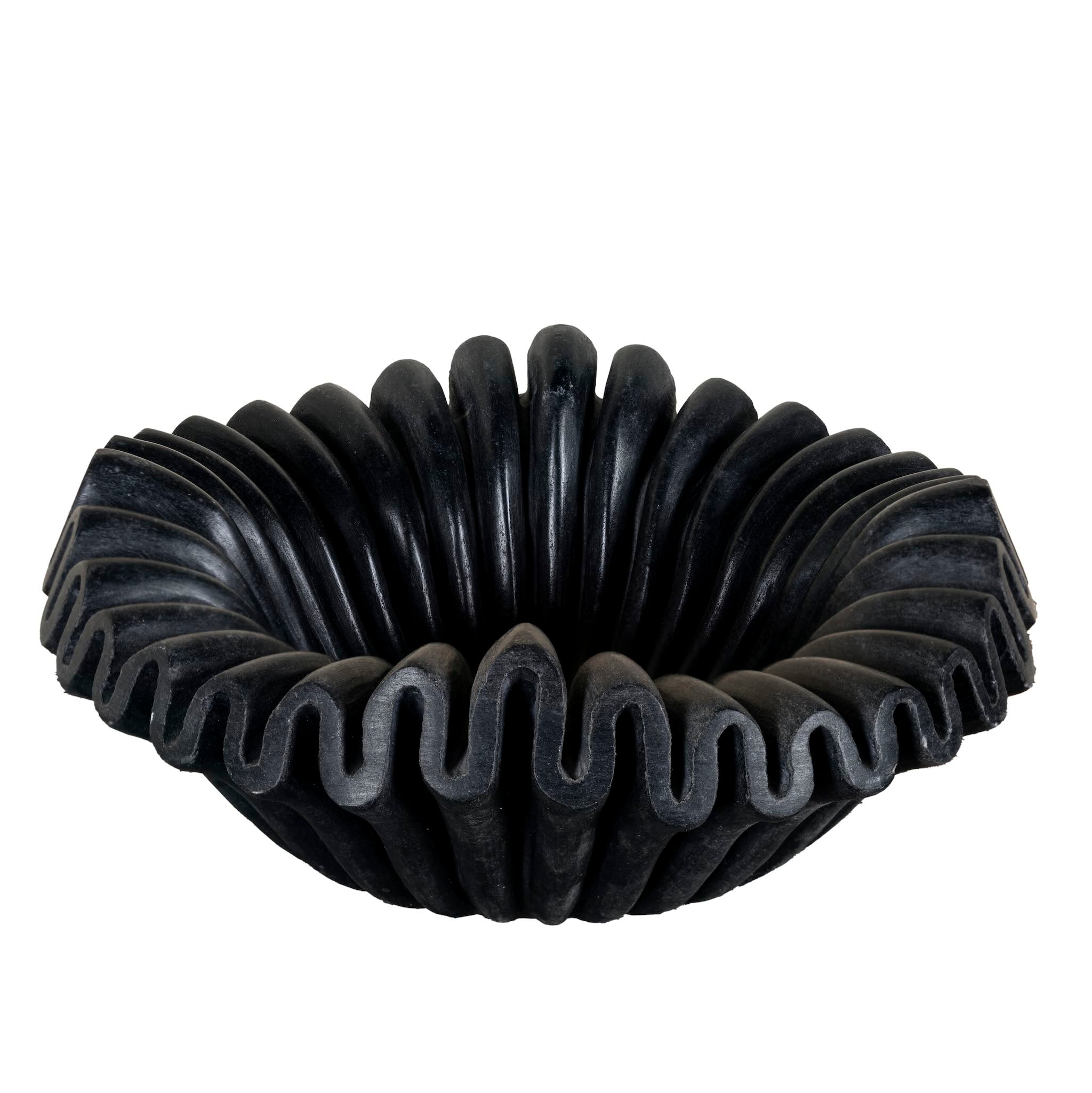 White background image of a hand-carved folded black marble bowl with wave-like design, perfect for vintage home decoration and Indian home decor.
