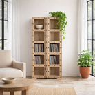 Lifestyle image of a reclaimed teak wood shelving unit with 10 compartments and original brass fittings – sustainable furniture combining practicality, style, and handcrafted quality.