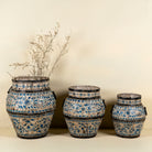 Set of 3 hand-painted decorative iron pots in cream and blue floral designs, featuring traditional Indian motifs – perfect for vintage home accessories and painted iron decoration.