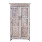 White background image of a hand carved mango wood wardrobe in floral design with ample storage in ibiza style.
