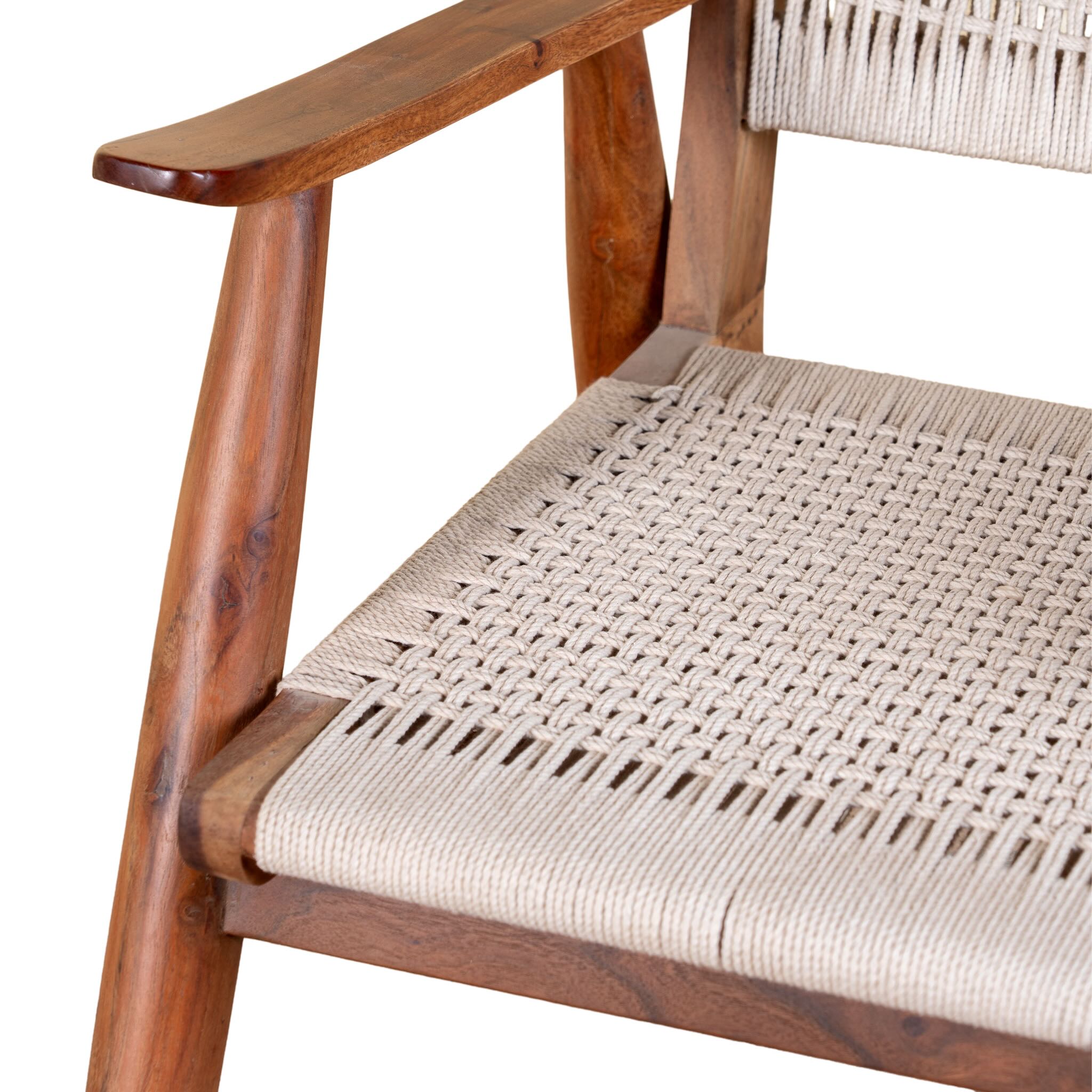 Close up image of a Chameli acacia wood chair with hand-woven cotton rope seat and backrest—an artisan-crafted piece of wooden seating blending comfort and natural materials.