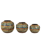 Three decorative vases with mosaic patterns on a white background