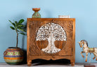 Carved mango wood furniture cabinet with Tree of Life design and whitewashed finish, 90 × 40 × 90 cm.