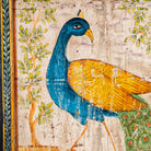 Close up image of a hand-painted wooden wall panel made from an old teak door with peacock motif; vintage wall panels and India home accessories, 88 × 8 × 171 cm.