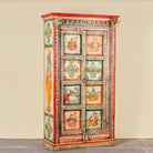 Side angle image of a antique hand painted wardrobe made from reclaimed teak wood with Indian motifs; unique furniture and teak wood furniture, 113 × 50 × 190 cm.