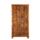 White background image of a hand-carved mango wood wardrobe with floral motifs; wooden wardrobe in natural finish, 100 × 45 × 190 cm.