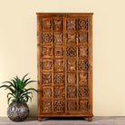 Hand-carved mango wood wardrobe with floral motifs; wooden wardrobe in natural finish, 100 × 45 × 190 cm.