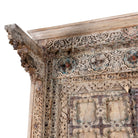 Close up picture of a one-of-a-kind Indian solid reclaimed teak wooden wardrobe with hand-carved details, part of our premium teak wood furniture collection.