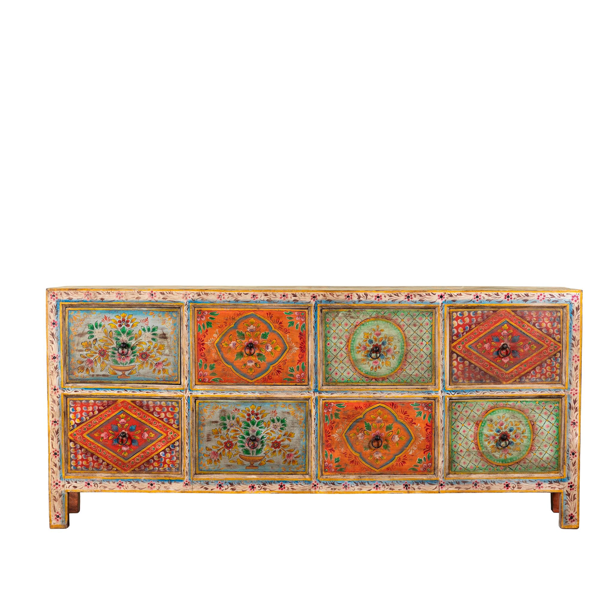 White background image of a hand painted sideboard with 8 drawers made of natural mango wood; artisanal chest for bohemian interior, 200 × 40 × 90 cm.