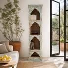 Lifestyle image of a hand-carved mango wood bookshelf with oriental detailing and natural wood finish – carved wooden furniture and vertical shelving for refined, rustic interiors.