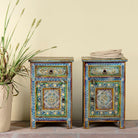 Pair of hand-painted nightstands made of reclaimed wood in boho style, sustainable furniture with drawer and cabinet, 45 × 35 × 70 cm.