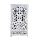 White background image of a hand-carved mango wood wardrobe with floral and geometric patterns and white-washed finish – carved wooden furniture for boho chic and Mediterranean-inspired interiors.
