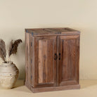 Foldable bar table made of reclaimed teak wood with inside storage.