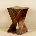 Front view of a twisted Mango wood hand crafted side table.