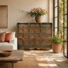 Lifestyle image of a Damchya antique Indian marriage chest on wooden wheels crafted from reclaimed teak wood 130cm