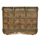 White backround image of a Damchya antique Indian marriage chest on wooden wheels crafted from reclaimed teak wood 130cm