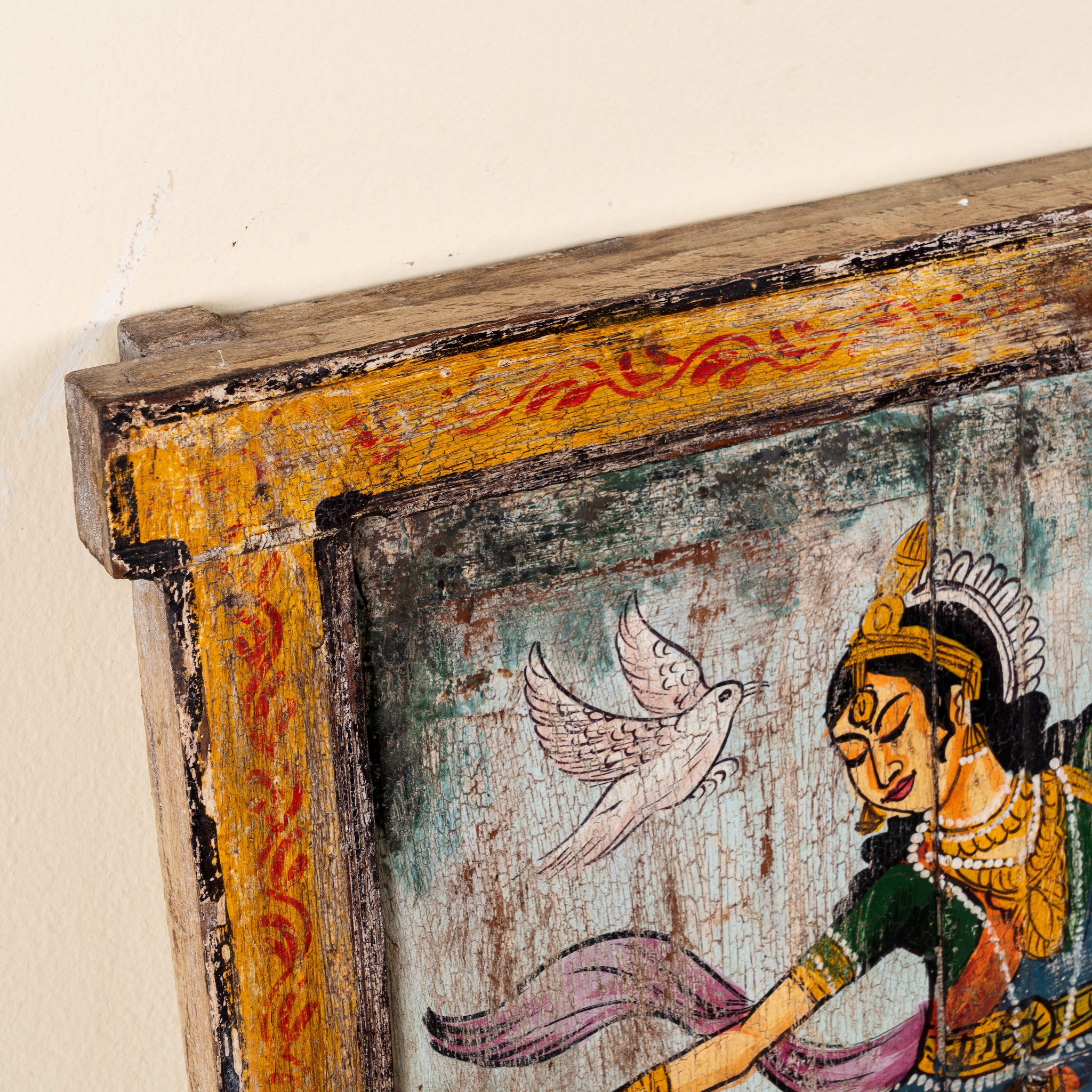 Close up image of a Dancer antique reclaimed wood mirror with hand-painted classical Indian dancer artwork on an authentic vintage wooden mirror frame, 50x50x5cm.