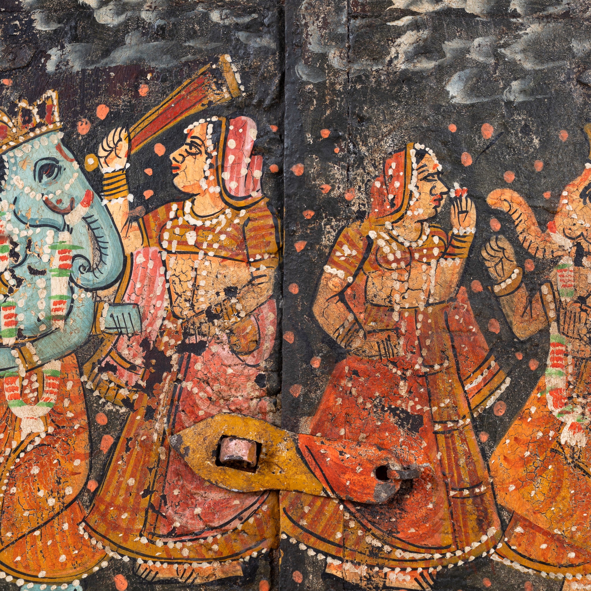 Close up image of a Dancing Ganesh antique reclaimed wood mirror with hand-painted Indian artwork on an authentic vintage reclaimed wooden mirror frame, 50x50x5cm.