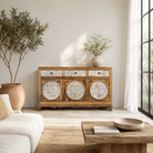 Lifestyle imagination o a hand carved wooden sideboard made from mango wood with floral carvings and curved base, mango wood furniture with storage, 150 × 40 × 95 cm.