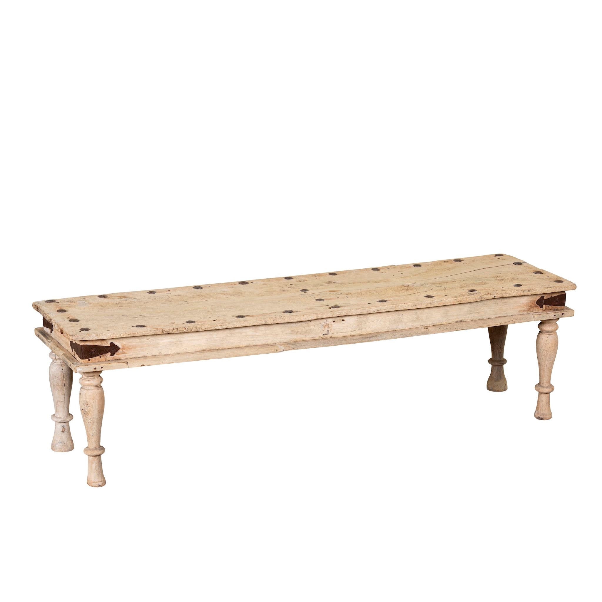 White background image of a sandblasted reclaimed teak bench with turned legs, rustic finish; unique teak furniture, 152 × 40 × 44 cm.