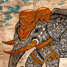 Close up image of a Dhairya hand painted reclaimed Indian teak door panel wall art with elephant motif 170cm