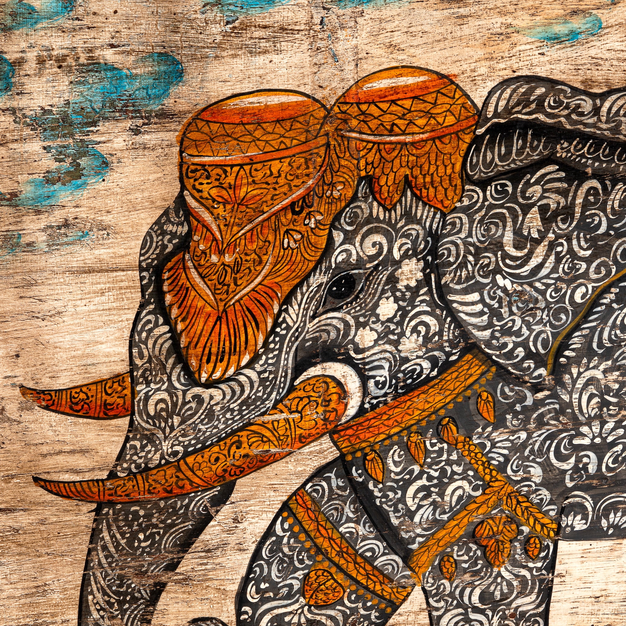 Close up image of a Dhairya hand painted reclaimed Indian teak door panel wall art with elephant motif 170cm