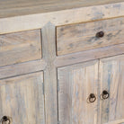 Close up image of a sustainable bathroom sideboard made of reclaimed wood with four cupboards and three drawers, rustic finish, 180 × 40 × 90 cm.