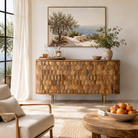 Lifestyle image of a handcrafted mango wood sideboard with hexagonal inlay design and brass-finished legs—artisanal bedroom furniture combining craftsmanship and modern elegance.