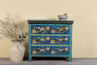 Hand-painted cupboard made of reclaimed wood with floral drawer fronts – Divisha model by Om Home & Garden