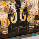 Close up image of a Ehsaan hand painted reclaimed Indian teak door panel wall art with two elephant motifs 168cm