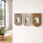 Lifestyle imagination of hand-carved wooden wall mirrors Sathvik with ornate jharokha arches and floral detailing, available in various vintage finishes. A unique Indian decoration and vintage home accessory perfect for vintage home decor settings.