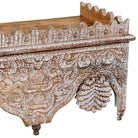 Close up image of a carved mango wood shelf in distressed vintage finish; artisanal furniture and vintage home decor, 90 × 25 × 30 cm.