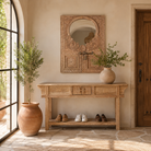 Lifestyle image of a hand carved teak wood mirror made from an antique Indian window frame with brass lock; unique wooden furniture, 60 × 70 cm.