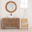 Lifestyle imagination of a reclaimed wood sideboard made from antique teak doors with carved detailing; teak furniture, 130 × 38 × 83 cm.