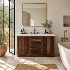 Lifestyle image of a wabi sabi furniture driftwood sideboard with white marble top, minimalist Japandi cabinet with drawers and sliding surface, 125 × 35 × 75 cm.