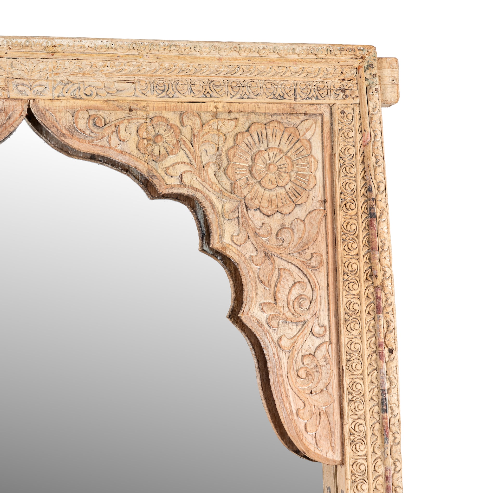 Close up image of a Farida reclaimed teak wood wall mirror made from an original carved Indian window frame with bleached finish 165cm