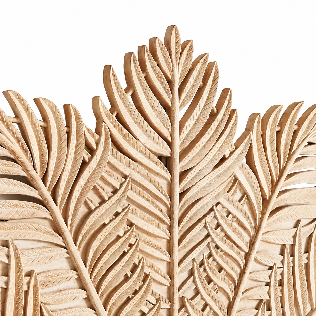 Close up image of a mango wood bed frame with a hand carved headboard in Farn design.