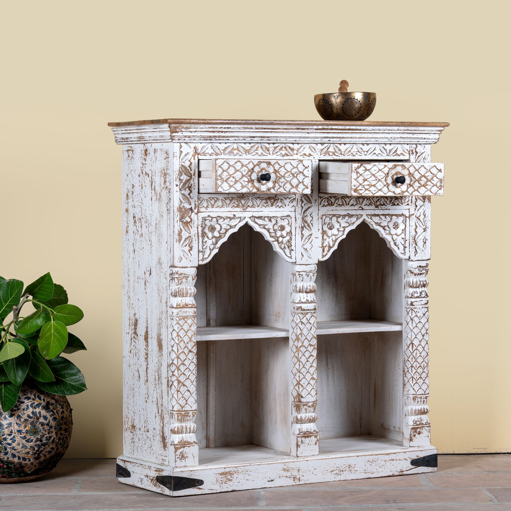 Side angle image with open drawers of a handcrafted mango wood shelving unit with balanced square design – vintage home accessories display shelf with natural wood finish and artistic expression.