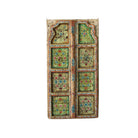 White background image of a Gitra hand-painted teak door panel featuring floral motifs in soft pastels and a carved arched frame—an elegant and unique Indian wall decoration repurposed from antique architecture.