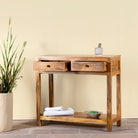 Open drawer image of a Ibiza style reclaimed wood console table with two drawers and bottom shelf, warm natural finish, 100 × 40 × 90 cm.