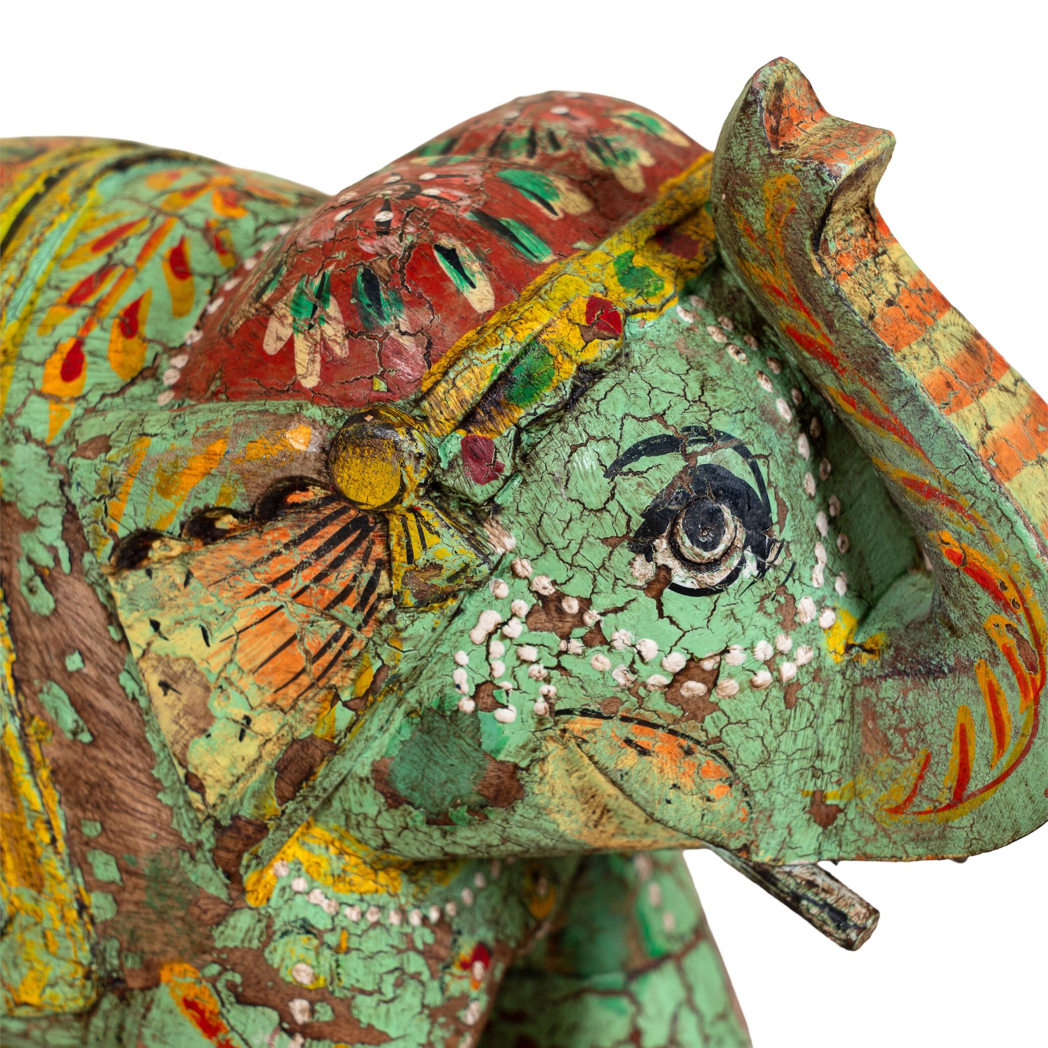 Hand‑painted wooden elephant decoration with colorful folk art motifs, a unique Indian home accessory and vintage home decor accent.