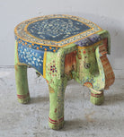 Hand-painted wooden elephant-shaped side table with Indian folk art motifs and floral details, perfect for vintage or global home decor.